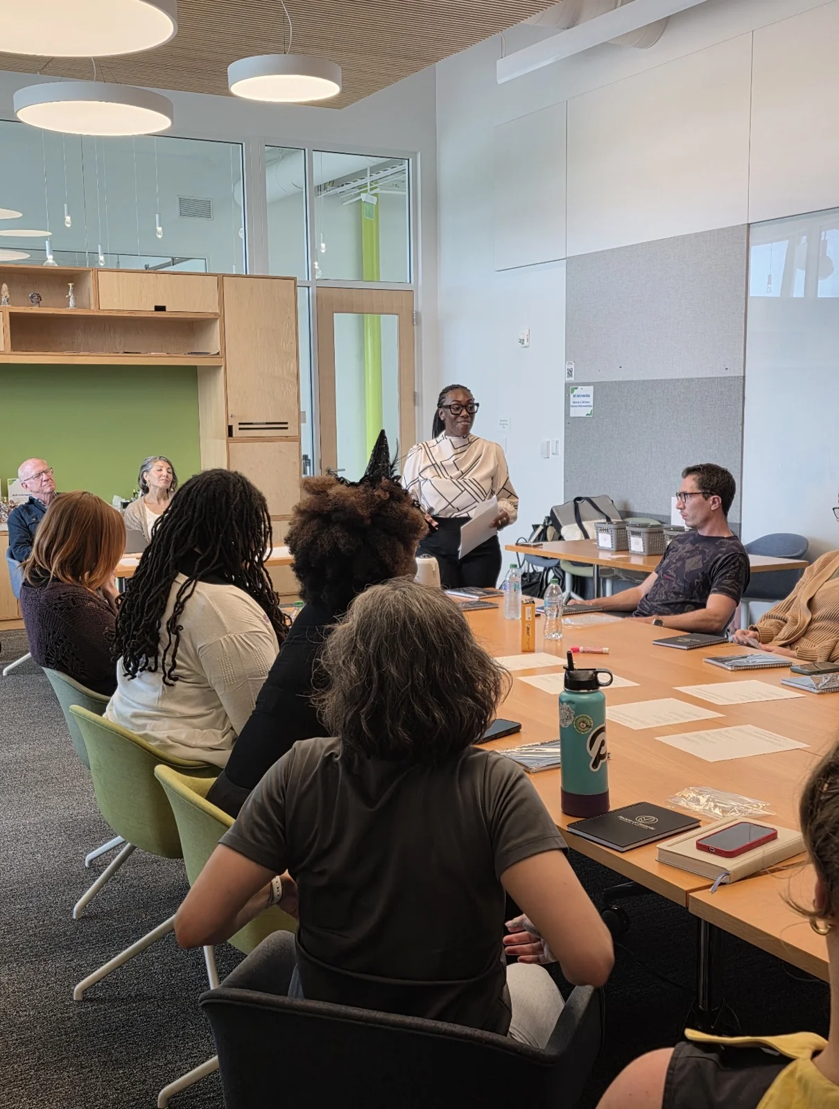 Employees taking part in a Peace of Serenity wellness workshop