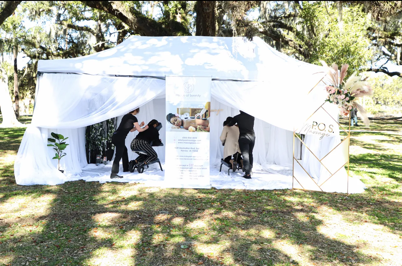 Peace of Serenity’s white outdoor wellness tent set up at an event